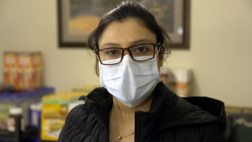 Close-up of a woman wearing a medical face mask